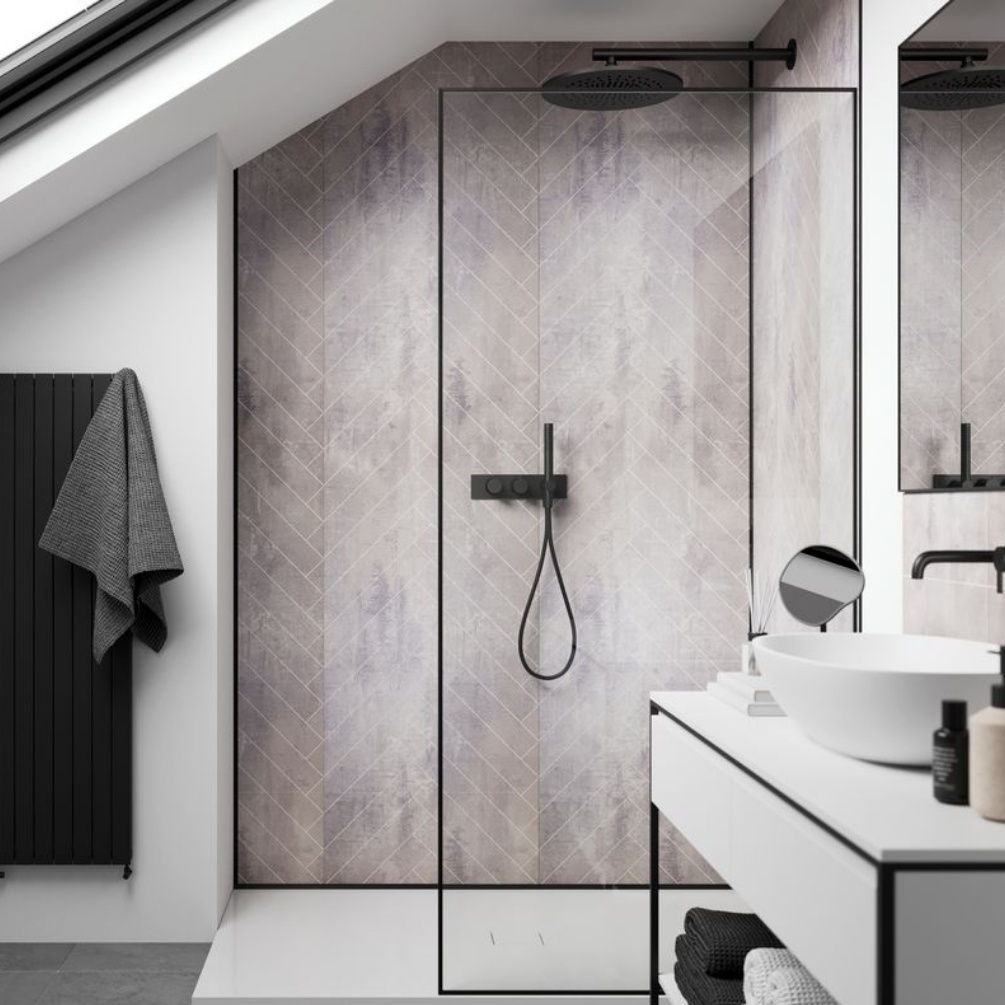 Lifestyle image of the Showerwall Laminate Cement 2400mm x 600mm Herringbone Tile Effect Wall Panel - SWT04 installed on one wall within a walk-in shower enclosure